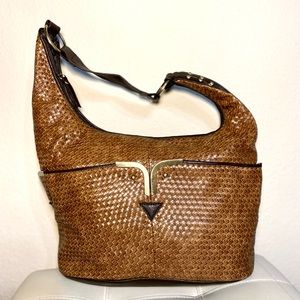 Covington Bohemian style purse with metal accents